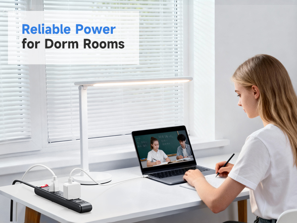 Close-up of six outlets on the Cable Matters black surge protector.