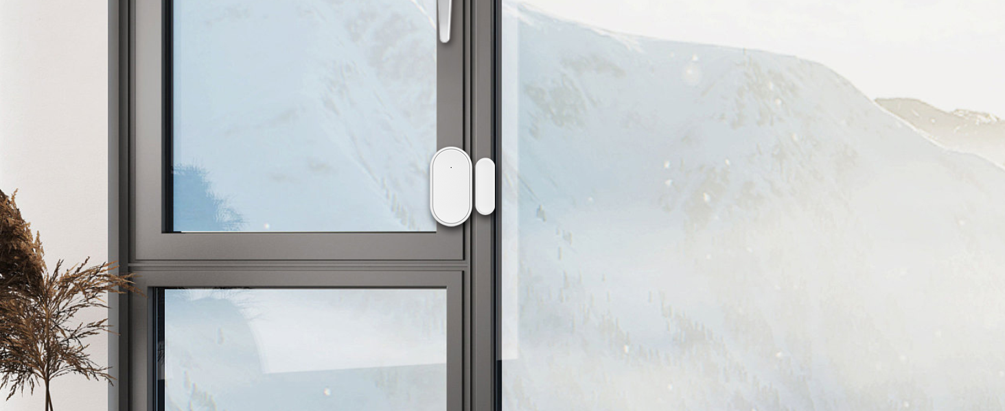 Close-up view of a modern door handle or pull bar mounted on a glass door with white wall visible in background.