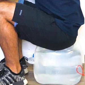 Man sitting on the 5 gallon container
