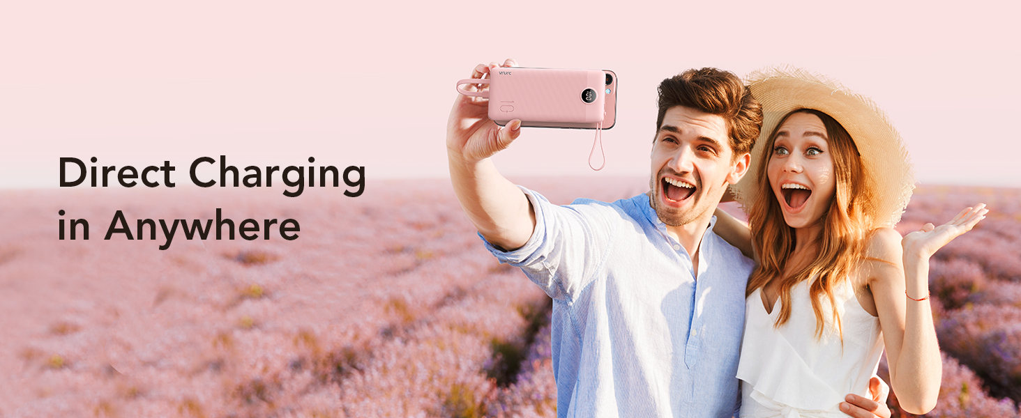 a man taking a picture of a lavender field