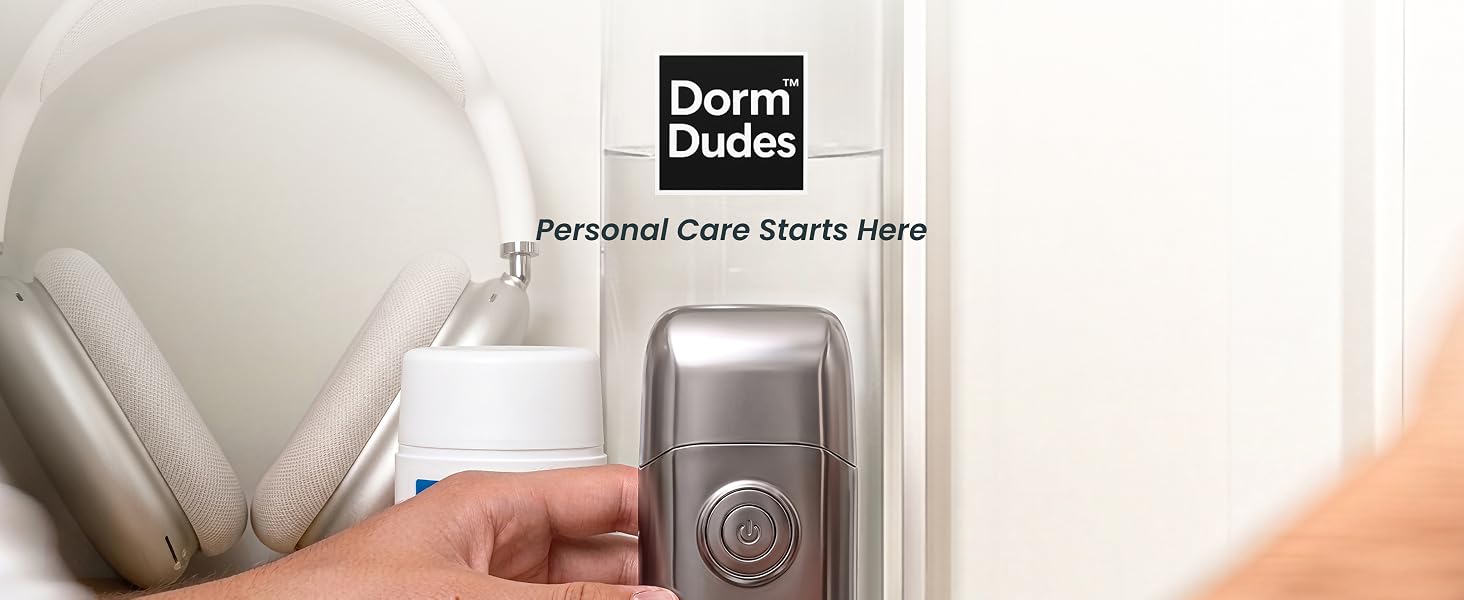 DormDudes electric razor in a bathroom next to deodorant and headphones