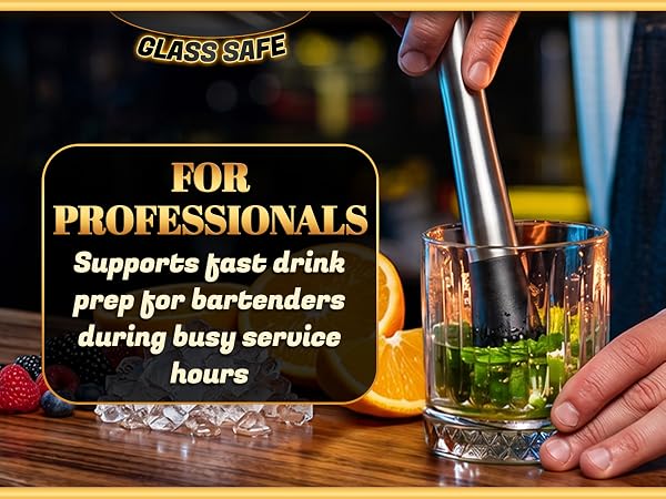 fruit masher for drinks used by bartender in glass with herbs for cocktail preparation