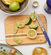 Totally Bamboo Barbados Bamboo Wood Cutting Board with sliced limes.