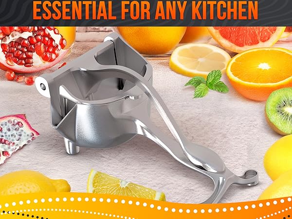 Lemon squeezer manual metal press placed on table with lemons, orange slices, and mint leaves
