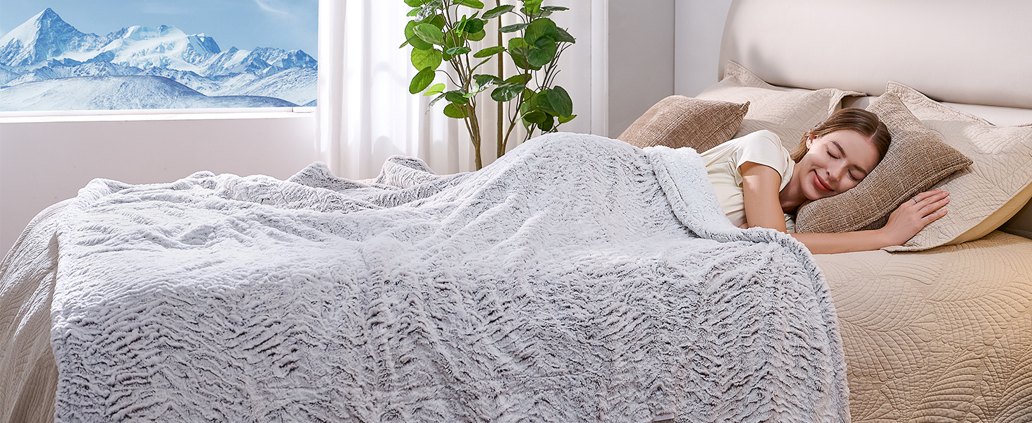 Enjoying the warmth of the heated blanket on the bed