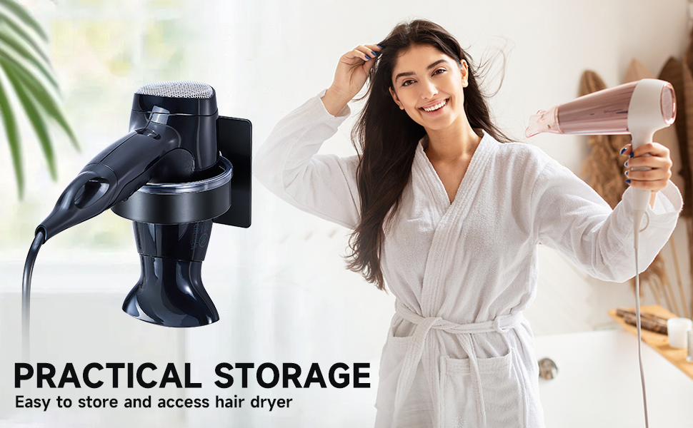 Wall-mounted hair dryer holder with black dryer. Woman in bathrobe using pink dryer. Text: 'PRACTICAL STORAGE Easy to store and access hair dryer'.