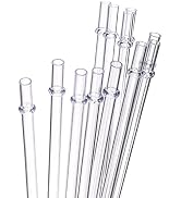 Clear glass reusable drinking straws arranged at an angle, showing transparent construction and straight design.