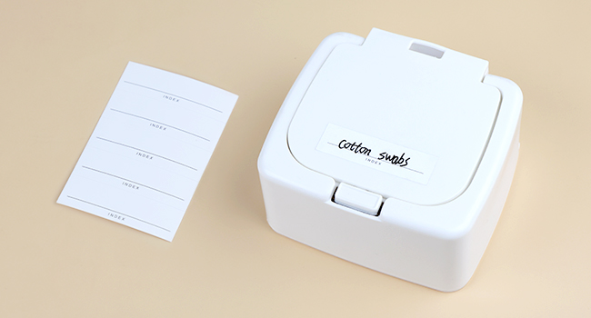 Push-button storage box