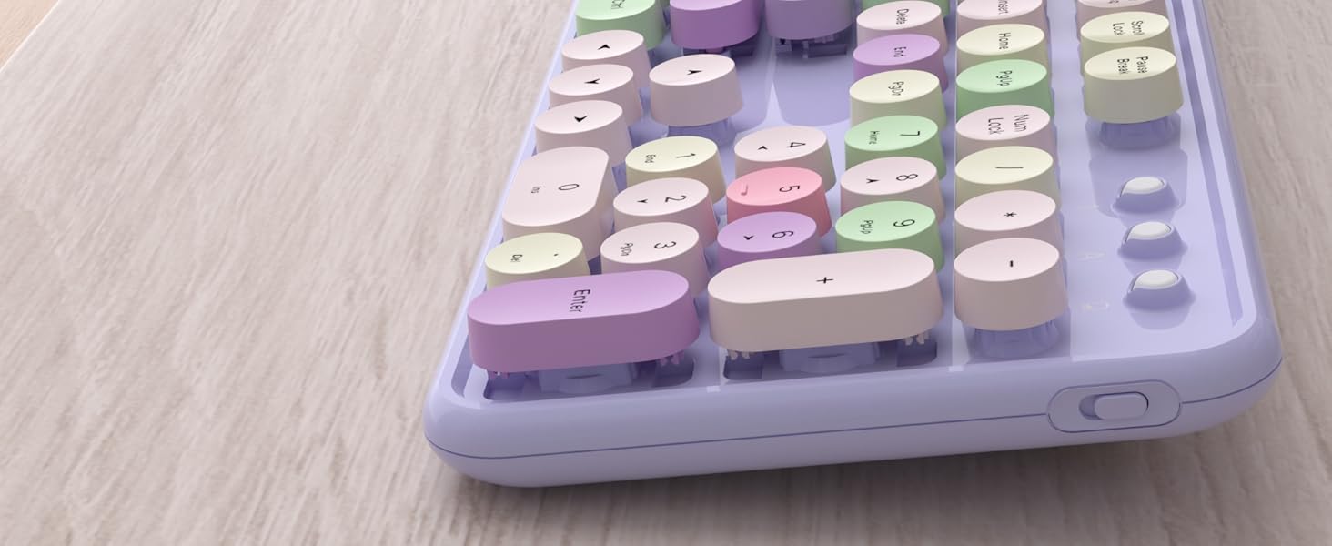 purple colorful wireless keyboard and mouse