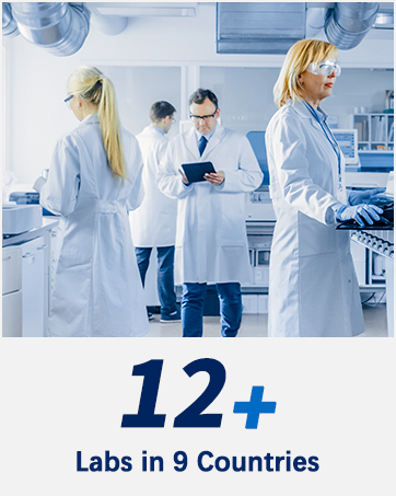 a group of people in lab coats and lab coats.