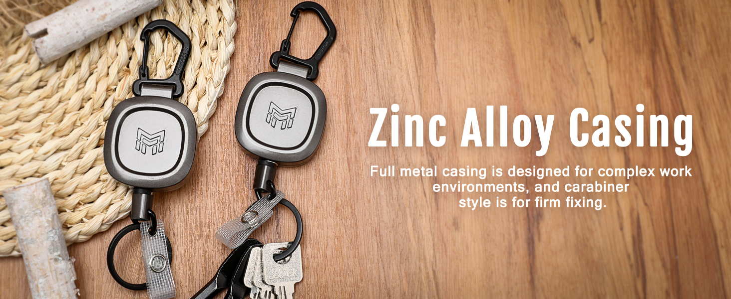 a metal case with a key chain attached to it.