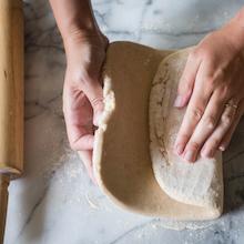 white marble pastry board black baking bake rolling pin cookie cutter whisk balloon 