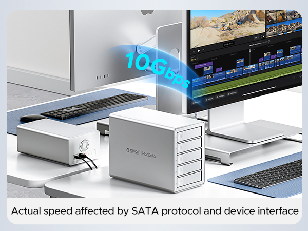 External storage device setup with multiple drive bays, shown connected to computer display with data transfer interface information.