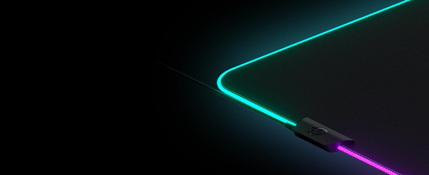 -Top left corner of a SteelSeries QcK Prism mousepad