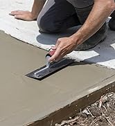 FT144 trowel smoothing concrete on a fresh sidewalk pour