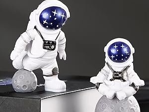 blue astronaut statues