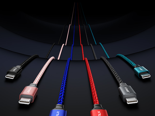 Six colorful USB-C cables arranged in a fan shape against a black background, showcasing various colors including black, pink, blue, red, and green.