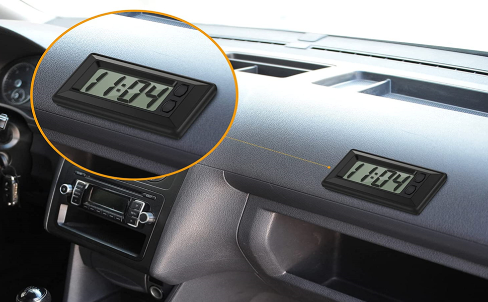 the clock on the car dashboard