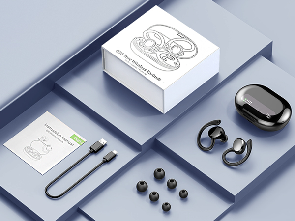 Wireless earbuds set with charging case, USB cable, extra ear tips, and product box on a blue-gray surface.