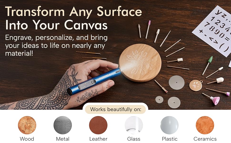 Hand using cordless engraving pen on wood with accessories for metal glass plastic leather