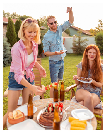 friends having a picnic in the backyard
