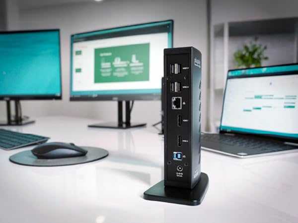 A laptop dock keeps your desk tidy while adding ports for displays, keyboards, and external drives