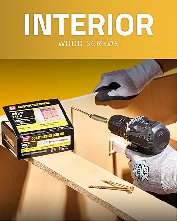 Image of person drilling into wood plank next to screws with text reading interior wood screws.