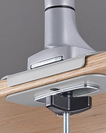 A flush grommet installation allows the desk to sit against the wall