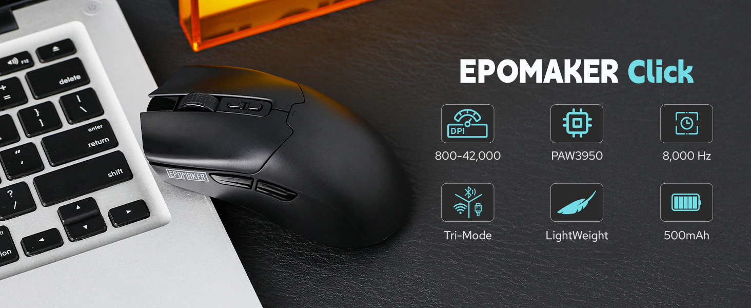 Wireless ergonomic mouse next to laptop keyboard. Product features include 800-12000 DPI, PMW3350 sensor, 3000Hz polling rate, tri-mode connectivity, ultralight design, and 500mAh battery.