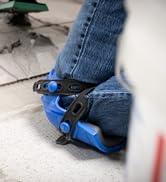 KN-1 Knee pads protecting someone&amp;#39;s knee while installing tile