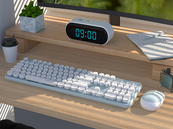 green white wireless keyboard and mouse