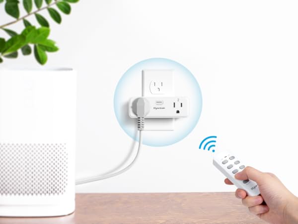 a hand-using remote control outlet plug to manage home appliances like air humidifier
