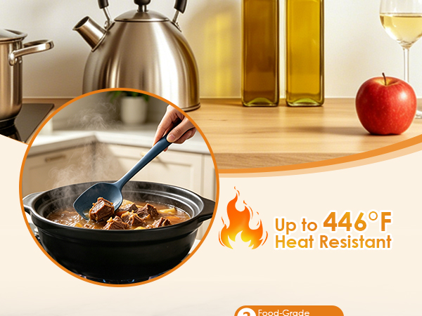 Silicone kitchen spatula stirring stew in a pot, heat resistant up to 446°F