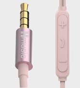 Close-up images of audio connector cables or adapters in pink and metallic finishes, showing various connection ends and ports.
