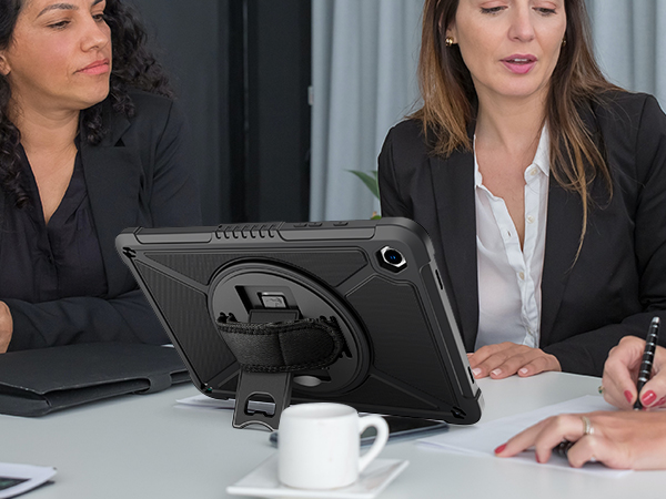 Professional office setting showing business meeting scenario with multiple participants around a conference table.