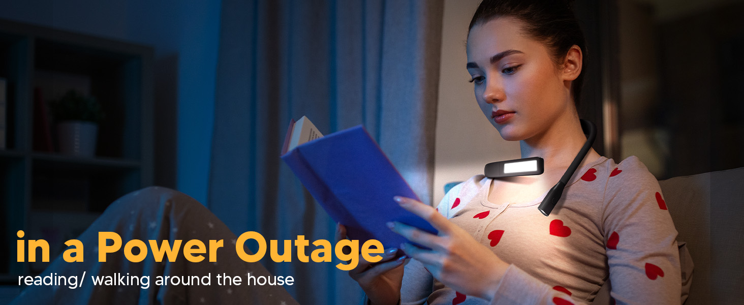 A young woman is studying bible during a power outage with EastPin reading light neck book light on