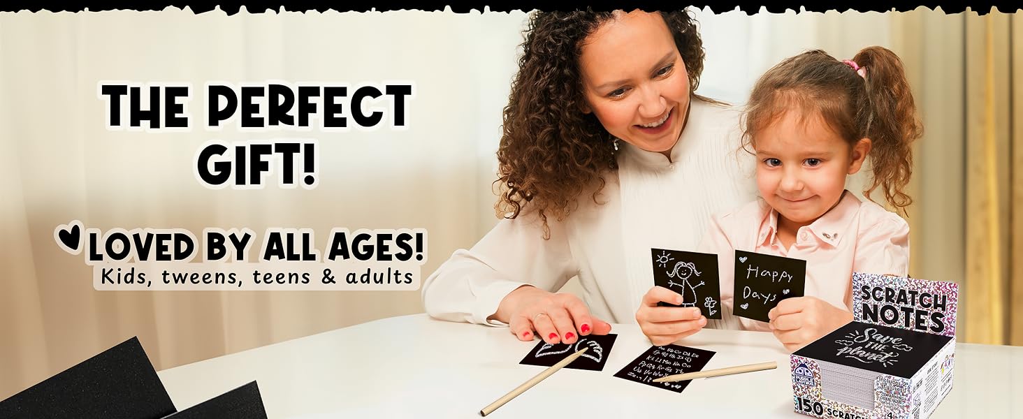 Mom and daughter smiling as they enjoy creating sparkling scratch art notes together at home.