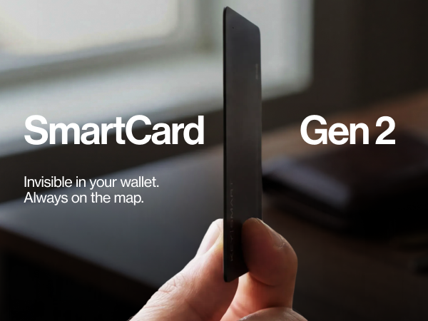 Text reads 'SmartCard Gen 2' and 'Invisible in your wallet. Always on the map.' Hand holding thin black rectangular card-sized device against blurred background.