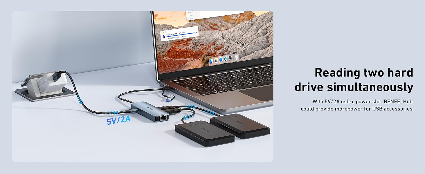 a laptop with a usb drive connected to it.