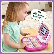 Kid pushes button on toy laptop. Screen displays Pixel eating pretzels: I’d like some pretzels.