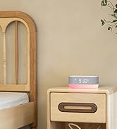 The alarm clock on the nightstand.