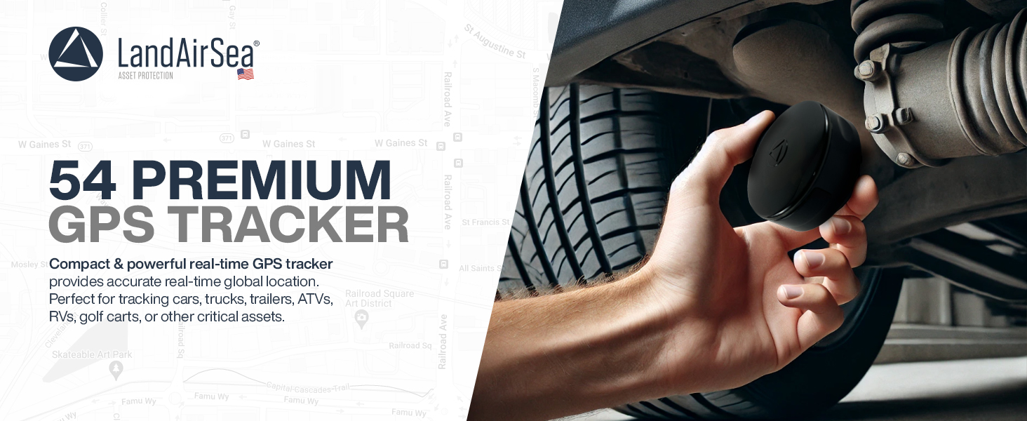 A man’s hand is holding a LandAirSea 54 compact GPS tracker and is about to place it under a car.