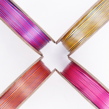 a close up of three different coloured wires.