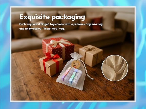 Gift-ready fidget clicker with elegant organza storage bag, ideal present for anxiety-relief
