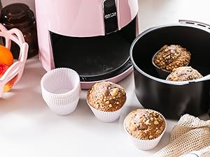 The Silicone Kitchen baking cups in Designer White being used in an Air Fryer