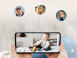 Smartphone displaying video call with baby playing, three profile icons above screen showing connected users.