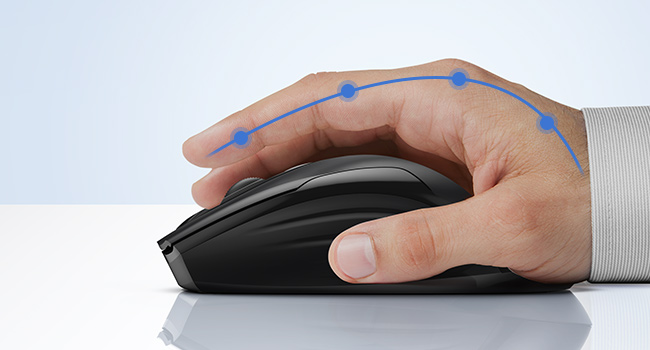 Close-up of a hand using an ergonomic computer mouse, with blue lines highlighting the hand's contour and contact points.