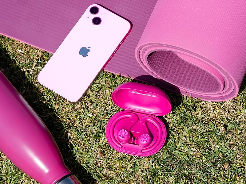 Jbuds sport 4 on yoga mat outside