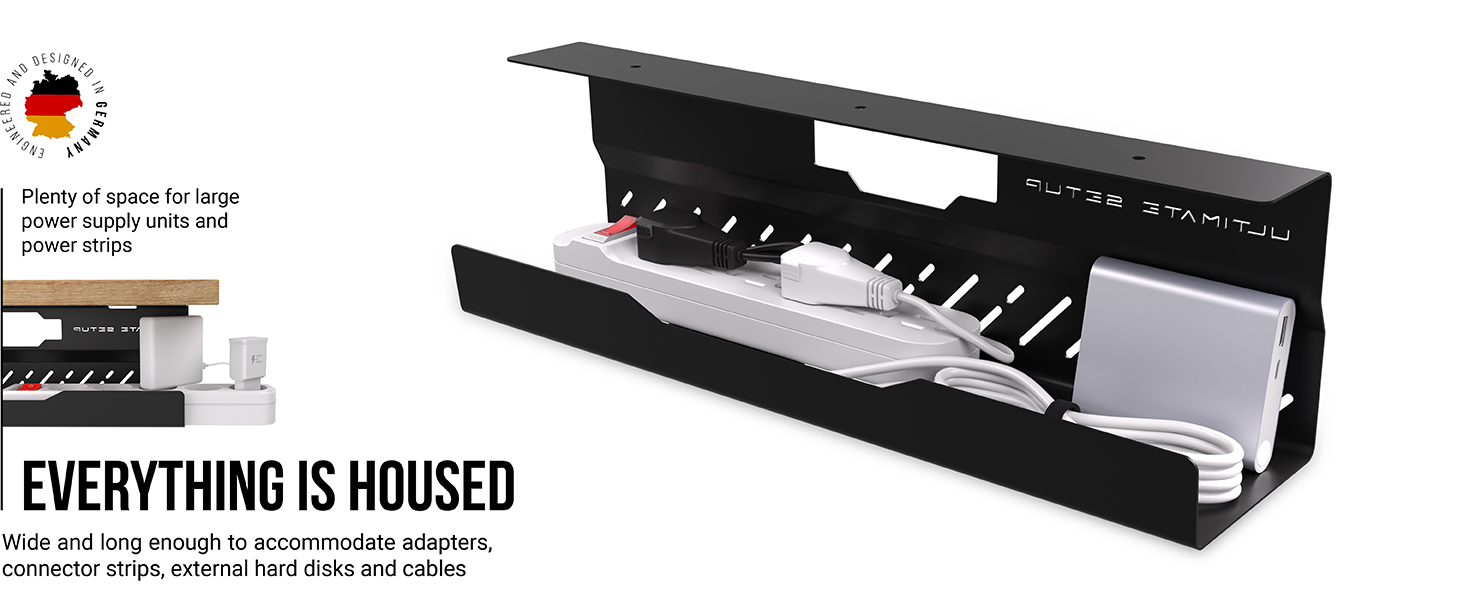 a black desk with a white power strip and a black cable.