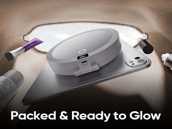 Compact folded lighted mirror fitting perfectly inside handbag ready for travel